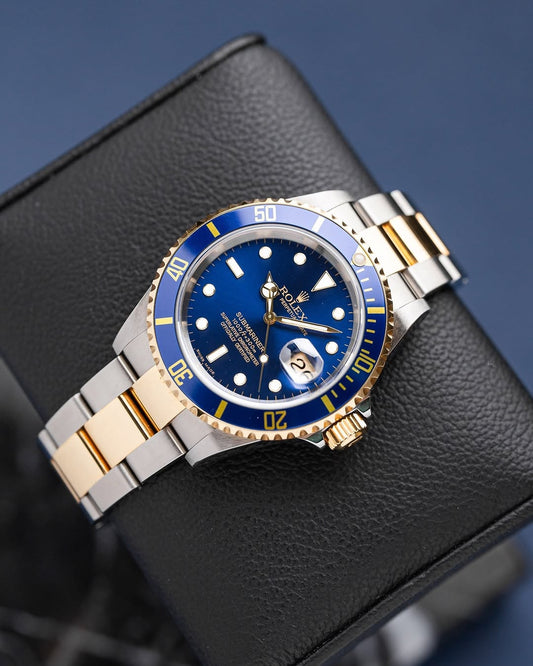 Rolex submariner gold fond bleu